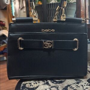 Bebe Black and Gold Leather Handbag